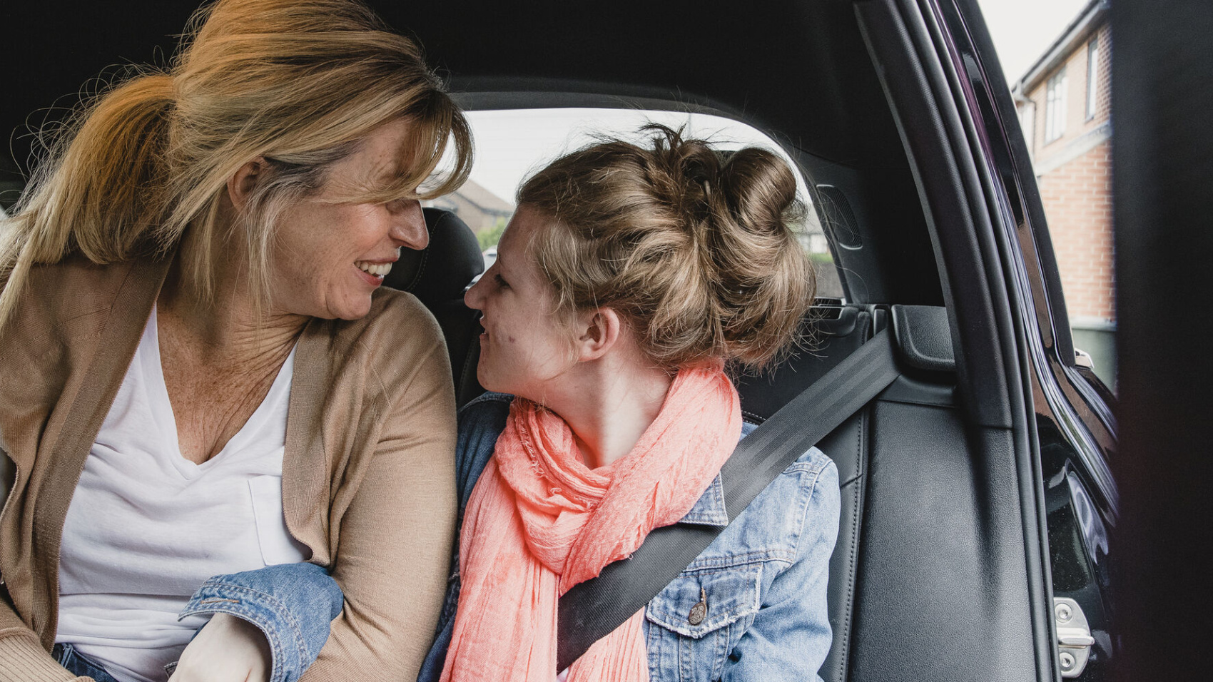 Mother and daughter in a car