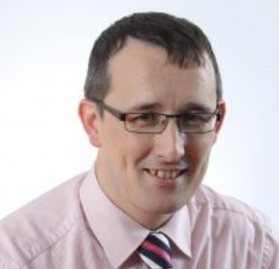 Headshot of Dr RIchard Nugent